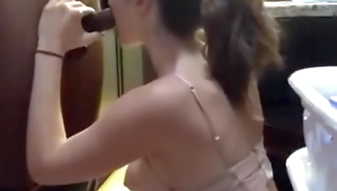 A horny teen 18+ gets it on in the kitchen on web cams