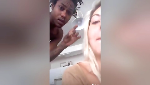 Amateur blonde with tattooed ass showing off her ass