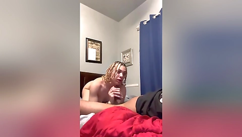 Blonde in red lingerie eats her boyfriend's big cock