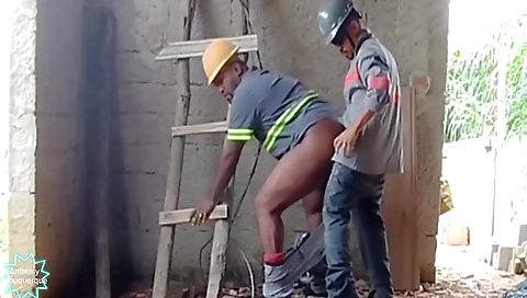 Big black guy is giving a blowjob to a brunette black girl