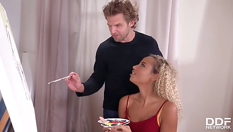 Ebony babe in a tattooed body is having sex with her boyfriend