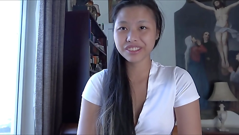 Asian brunette gets her pussy fucked in the bedroom